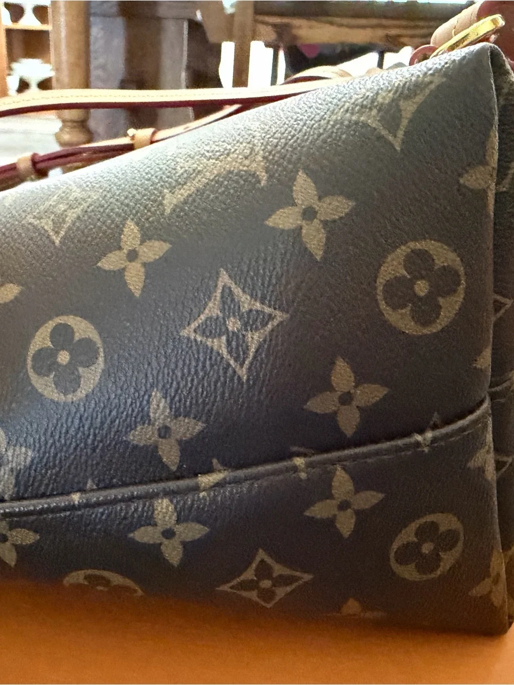 Louis Vuitton Monogram Canvas Backpack with Tan Leather Trim and Pink Charm